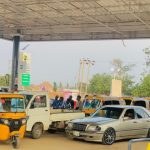 PETROL PRICE MAY HIT ₦2,000 PER LITRE IN NIGERIA, PETROAN WARNS Fuel queue at NNPC filling station